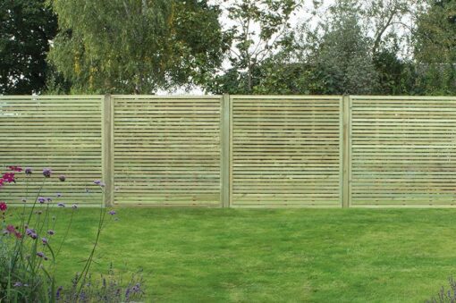 1.8m slatted fencing panels in garden