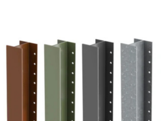 Four DuraPost Classic steel fence posts shown side-by-side in different finishes: brown, olive green, anthracite grey, and galvanised silver. Each H-shaped post features pre-drilled holes along the flange for securing fence panels.