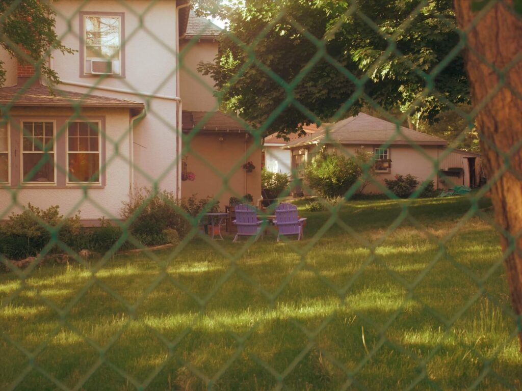 A view of the neighbours’ house without a wooden fence