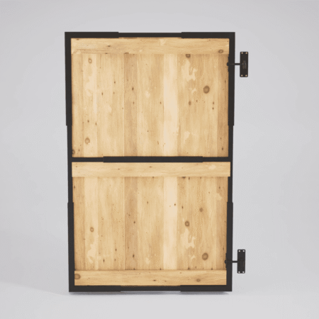 A Gatemate adjustable steel gate frame viewed from the rear. The black metal structure holds vertical timber boards and includes a central horizontal support bar. Attached heavy-duty hinges are visible on the right side.